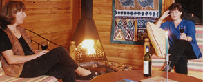 The fireplace in the guest lounge of the Lemon Tree self-catering cottage at Zauberberg Cottage